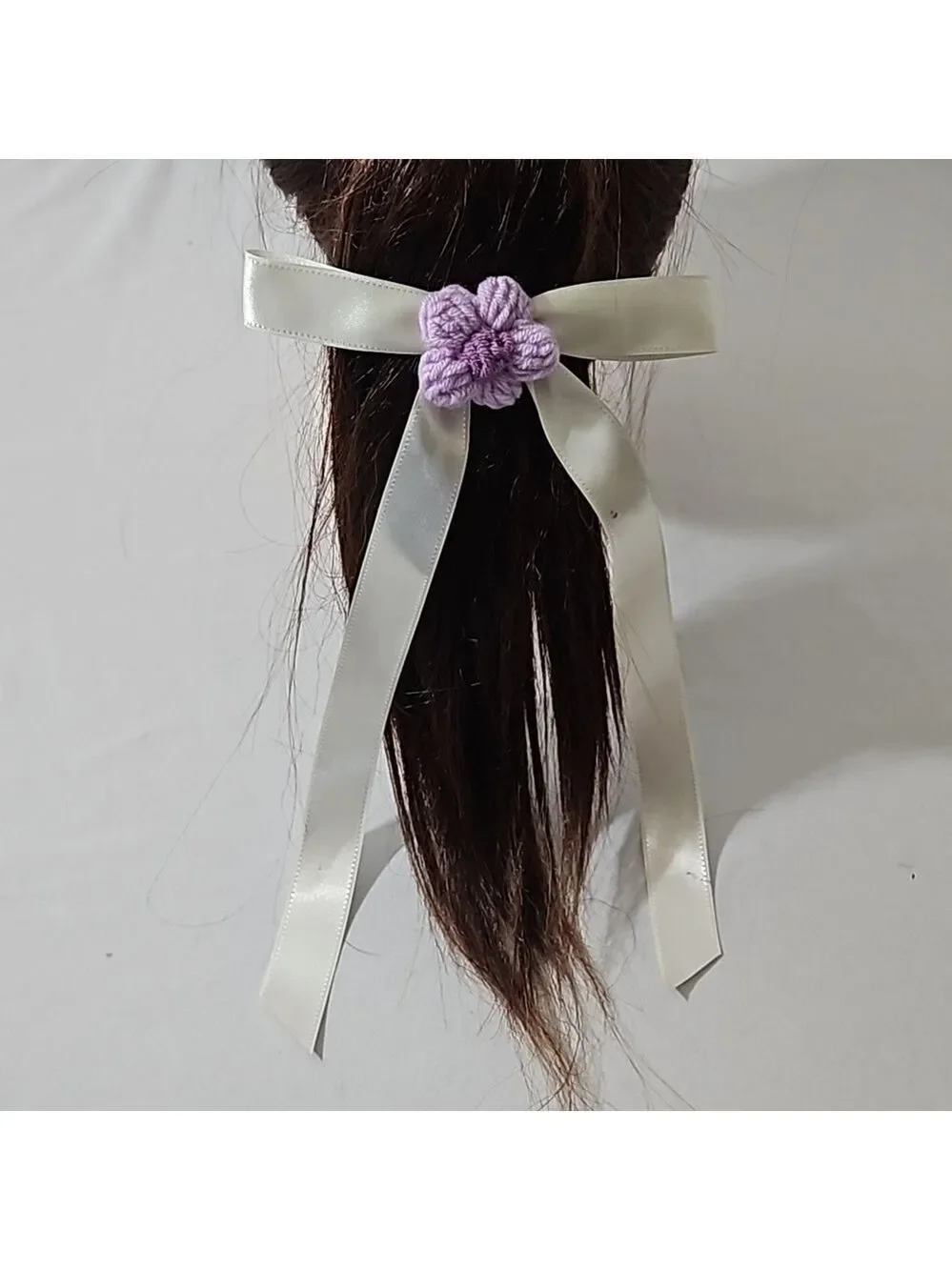 Hand Crafted Ivory Bow with Purple Crochet Flower